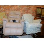 A beige leather electric reclining armchair, together with another armchair upholstered in cream and