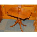A Bevan Funnel reproduction mahogany tilt top table, raised on tripod base, 49cm high, 53cm wide,