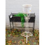 A rectangular wrought iron planter on stand, 70cm high, 73cm wide, 23cm deep, together with a