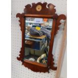 A Georgian style mahogany fret work wall mirror, 40cm high, 26.5cm wide.