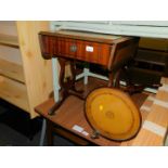 A reproduction mahogany drop leaf side table, with leather inlaid top, 56cm high, 44cm wide, 72cm