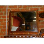 An oak swing frame toilet mirror, 50cm high, 60cm wide.