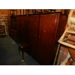 A pair of Stag mahogany wardrobes,each 178cm high, 128cm wide, 59cm deep., together with a
