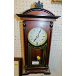 A Korean Highlands wooden cased wall clock, 48cm high.