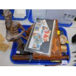 A truncheon, Swiss carved box, mint commemorative stamps, carved Spanish figure, etc. (1 tray)