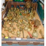 Figural brass Dutch boy and girl bells, enamel bells, cow bells, table gong and sundries. (1 tray)