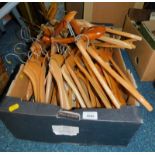 Moss Bros and other wooden coat hangers. (1 box)