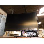 A Samsung 27" curved flat screen colour television, model no LV27F39SFEXXXU, no remote control.