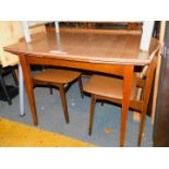 A Lebus teak and teak laminate dining table, 75cm high, 92cm wide, 77cm deep., and two chairs. (3)
