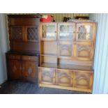 An oak laminate kitchen dresser, 182cm high, 92cm wide, 42cm deep, together with an oak veneered and