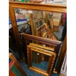 A rectangular gilt wall mirror, 68cm high, 72.5cm wide, further giltwood and gesso wall mirror inset