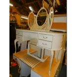 A French style painted dressing table, with typtych mirror, 140cm high, 127cm wide, 51cm wide.,