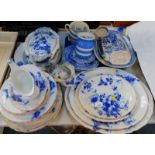 A Staffordshire earthenware late 19thC part dinner service, decorated in blue and white with