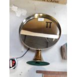 A Durleston circular gilt framed vanity mirror.