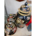 A Chinese Famille Noir ginger jar and cover, of baluster form, 53cm high, and a pair of ginger