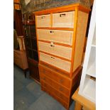 A pine and rattan chest, of two over three drawers, 89cm high, 74cm wide, 39cm deep, together with