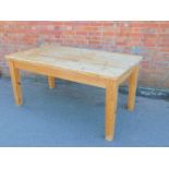 A pine refectory table, raised on square legs, 79cm high, 168cm wide, 90cm deep.