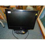 An LG 19" coloured television, model number 19LG3000-ZA, with remote.