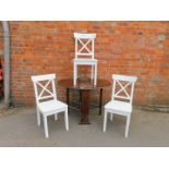 Three white painted IKEA dining chairs, together with an oak drop leaf table, 73cm high, 103cm wide,