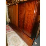 A Stag Minstrel double wardrobe, 177cm high, 128cm wide, 61cm deep, together with a similar Stag