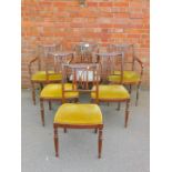 A set of six mahogany dining chairs, including three carvers.