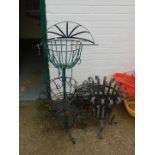 A wrought iron brazier, together with wall planters and plant stands. (8)