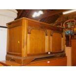 An oak blanket chest, with arched and moulded panels, raised on bracket feet, 51cm high, 95cm