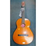 A BM Ronda Spanish classical guitar, 102cm high.