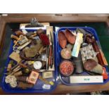 Vintage pens, briar wood pipes, an Ingersoll stopwatch and sundry collectables. (2 trays)