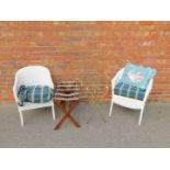 A pair of painted tub chairs, together with two luggage racks. (4)