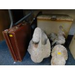 A Lloyd Loom style ottoman containing linen, two glass wall mirrors, two brown leather cases, one