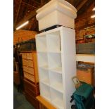 A white laminate pigeon hole unit of eight compartments, 150cm high, 79cm wide, 39cm deep., together