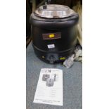 A Buffalo soup kettle, model L715B, with instructions.