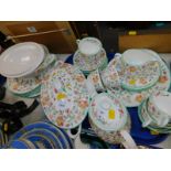 A Minton porcelain part dinner and tea service, decorated in the Haddon Hall pattern, including a