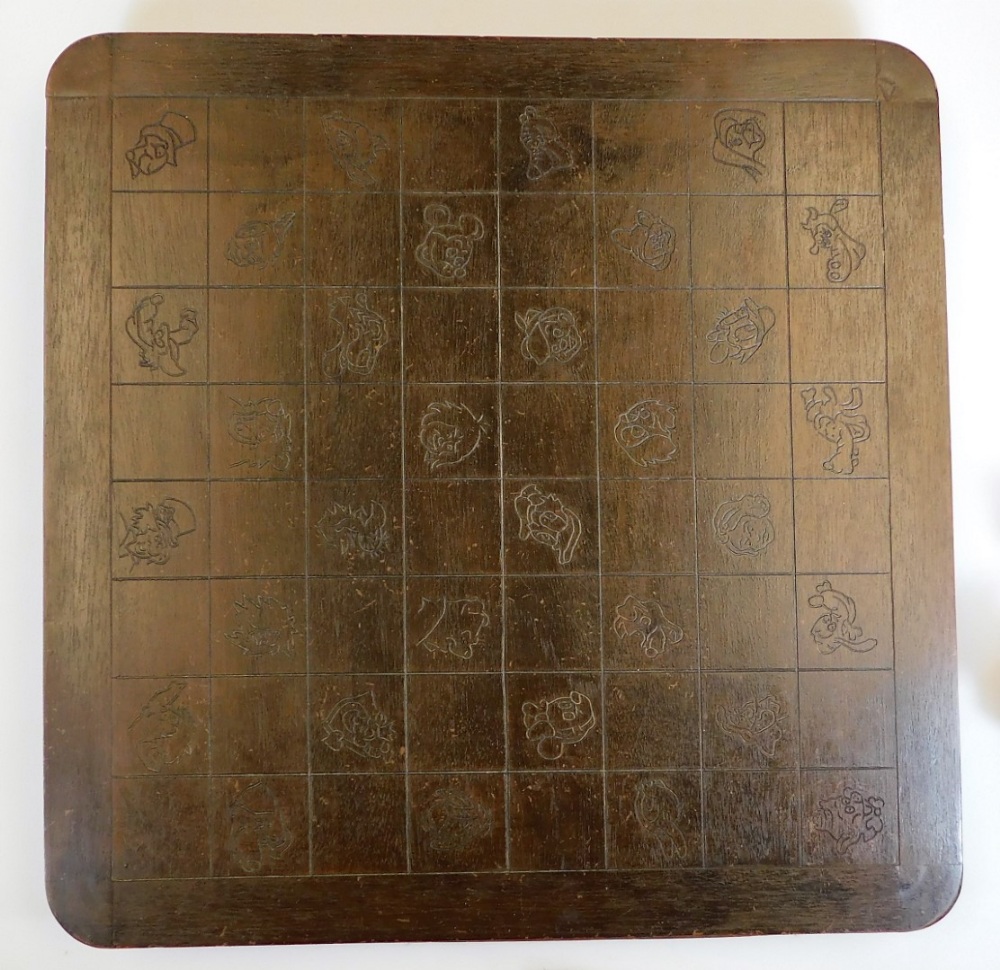 Disney interest, a hardwood chess set, of oblong form, with etched squares set with various Disney - Image 2 of 4