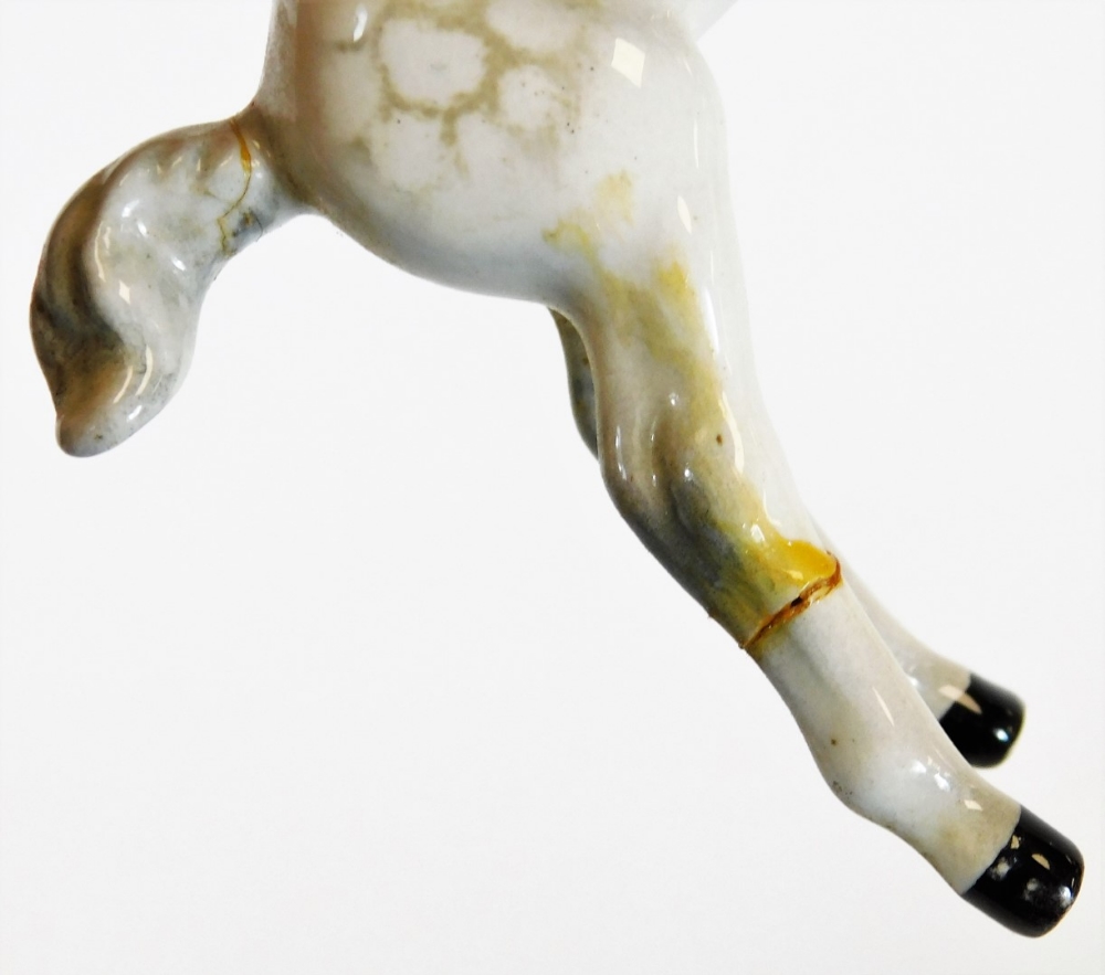 A Beswick foal, number 915, recumbent, 13cm wide, a grey foal, Poole dolphin and an otter, marked - Image 9 of 9