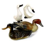 A Baja Indonesian painted decoy style duck, 40cm wide, another signed M Mackie' 86, two pottery duck