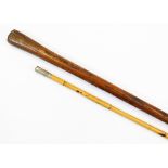 An early 20thC cane swagger stick, with plated ubique crested tip, 69cm long and a 19thC walking