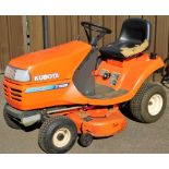 A Kubota Anti Scalp T1560 auto throttle ride-on lawn mower, in orange, with manual, 115cm high.