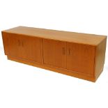 A vintage G Plan teak side cabinet, of rectangular form, with an arrangement of two cupboards on a
