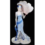 A Coalport Roaring Twenties figure Sadie, marked beneath, 31cm high.