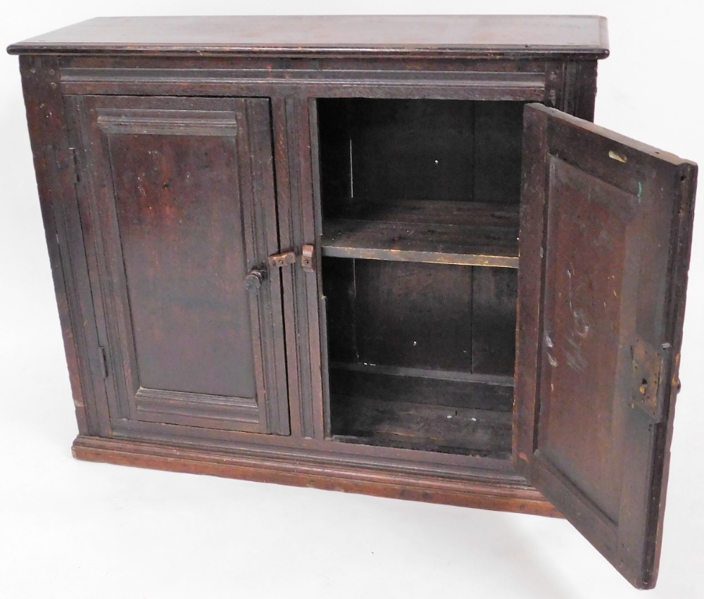 An late 17thC oak two door cupboard, with two panel doors, 103cm wide. - Image 3 of 3