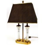 A Waterford style crystal glass and brass table lamp, with shade on turned stem and shaped base,