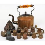 Various copper ware, a late 19thC mould, 12cm high, various other smaller and a kettle with amber