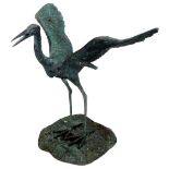 A 20thC Leonardo Rossi bronze heron figure, wings outstretched on naturalistic base, signed, 75cm