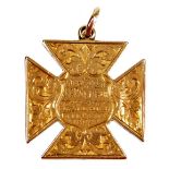 A Maltese cross pendant, marked J E Paluster by the Black Hill Glee Party 1897, partially etched