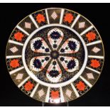 A Royal Crown Derby Imari pattern dinner plate, no. 1128, printed marks beneath, 27cm diameter.