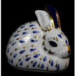 A Royal Crown Derby paperweight rabbit ornament, gilt stopper, 8cm wide. (boxed)