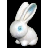 A 20thC Bourne Denby Dorothy Ware rabbit, in speckled cream colour way with green highlights to