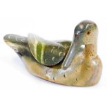 A 20thC Folk Art wooden decoy duck, with head turned, painted predominantly in green, unmarked, 16cm